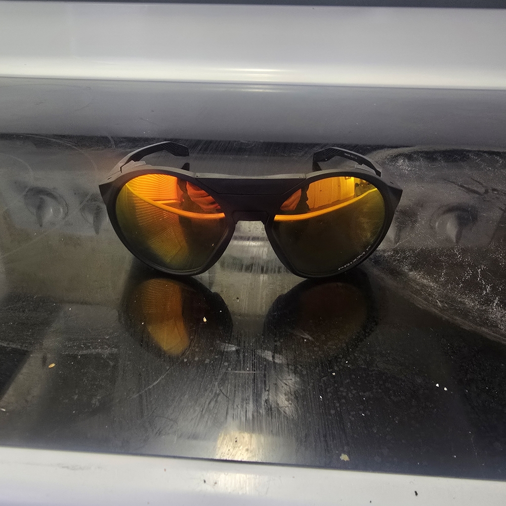 Oakley Sunglasses with Black Frame and Yellow Lenses